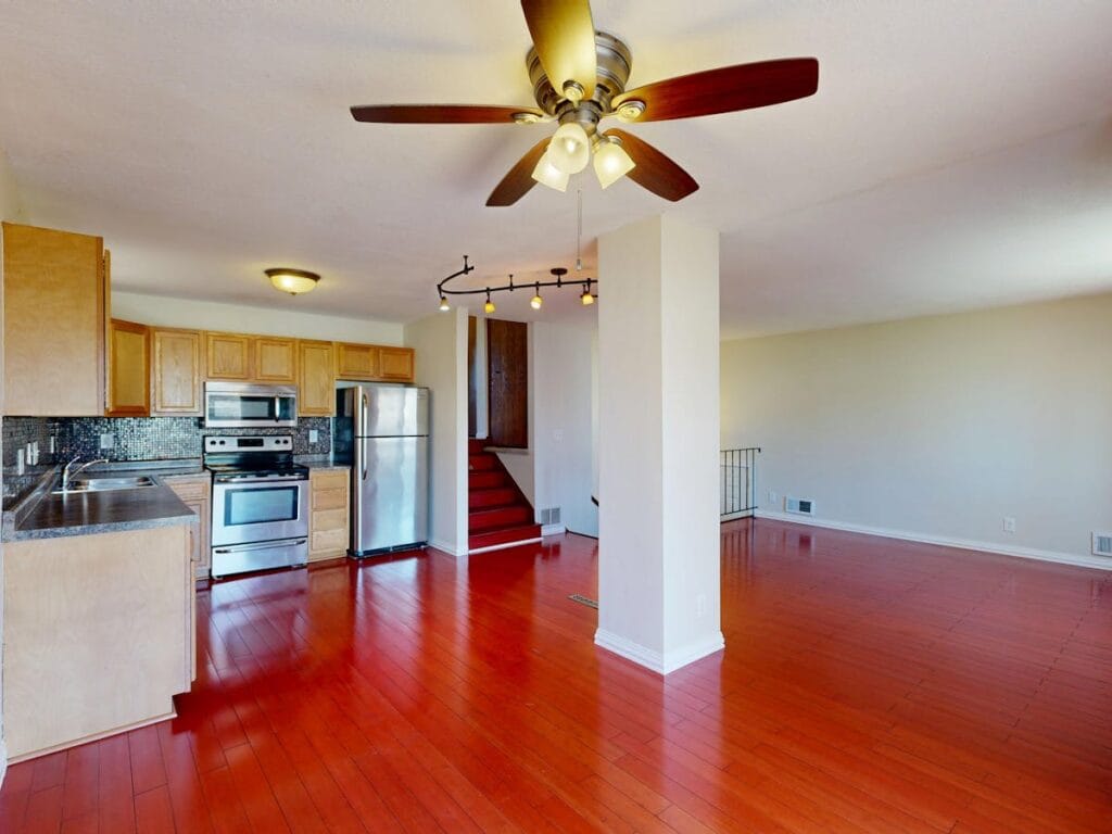 Open plan rental property with durable wood-look flooring in Houston TX